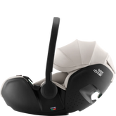 Britax Römer Baby-Safe Pro Lux Infant Car Seat in Taupe, featuring advanced safety features, ergonomic design, and superior side-impact protection for newborns and infants.