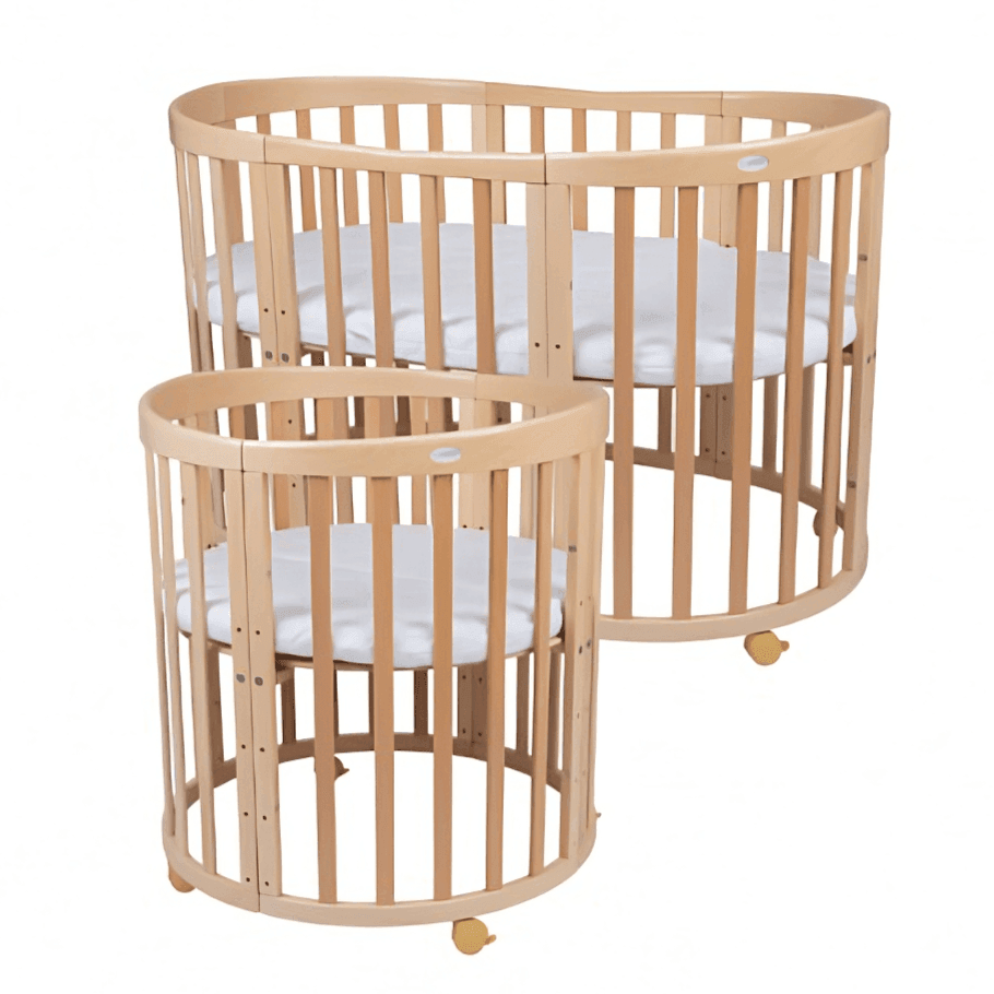 Oval mattress top for crib