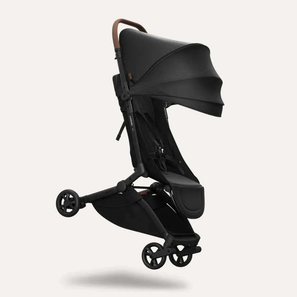 Redsbaby SKIP² Stroller in black, floating hero image showcasing its ultra-compact, lightweight design.