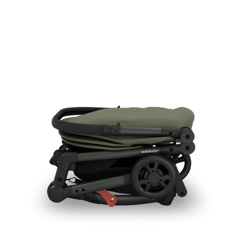 Redsbaby SKIP² Stroller in Ivy, side view folded for easy carrying and minimal storage space.