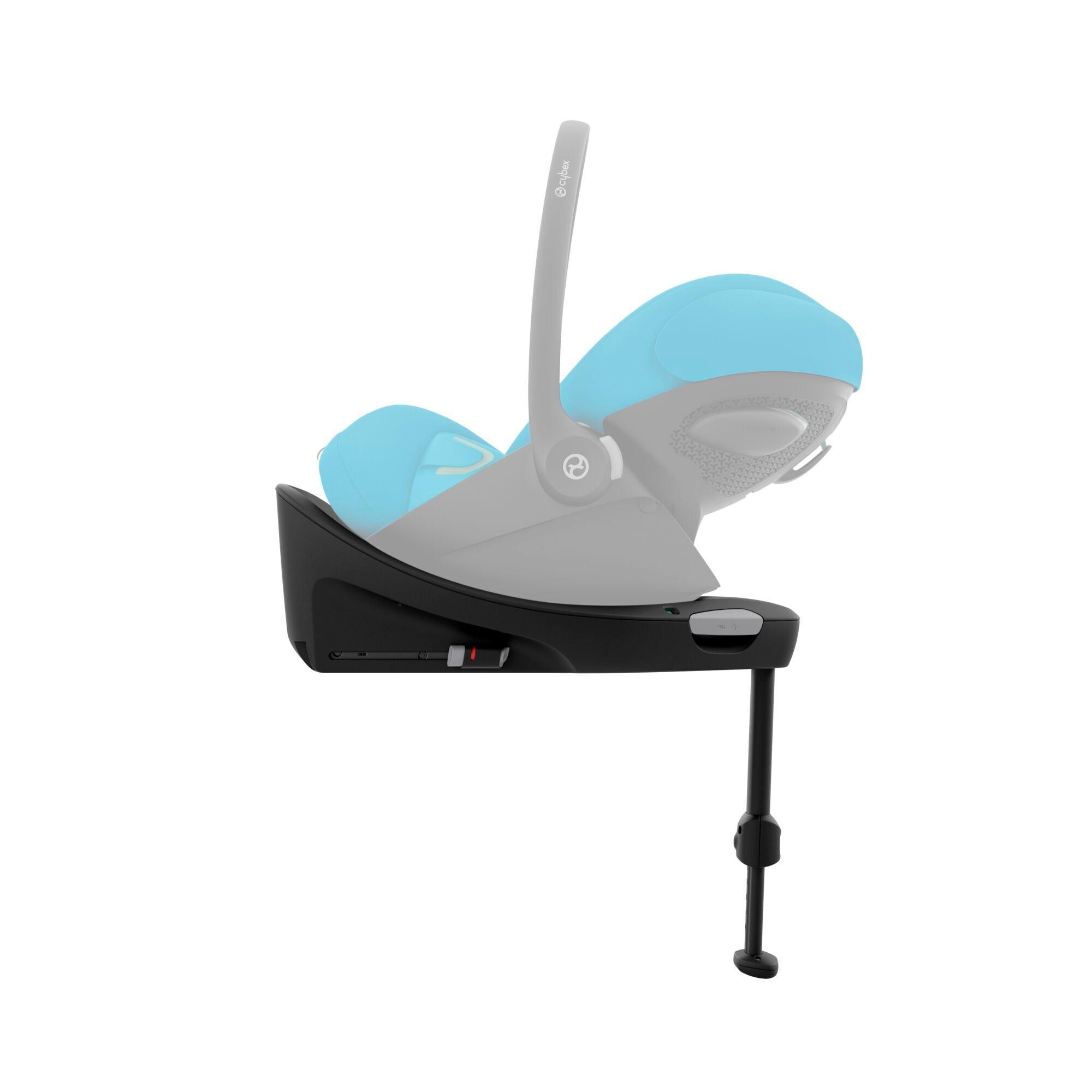 A semi-transparent CYBEX Cloud G car seat in Beach Blue Plus mounted on a black CYBEX Base G Isofix base. The image focuses on the base, showcasing its robust design with Isofix connectors and an extendable support leg, while the car seat's details are muted to emphasize the base.