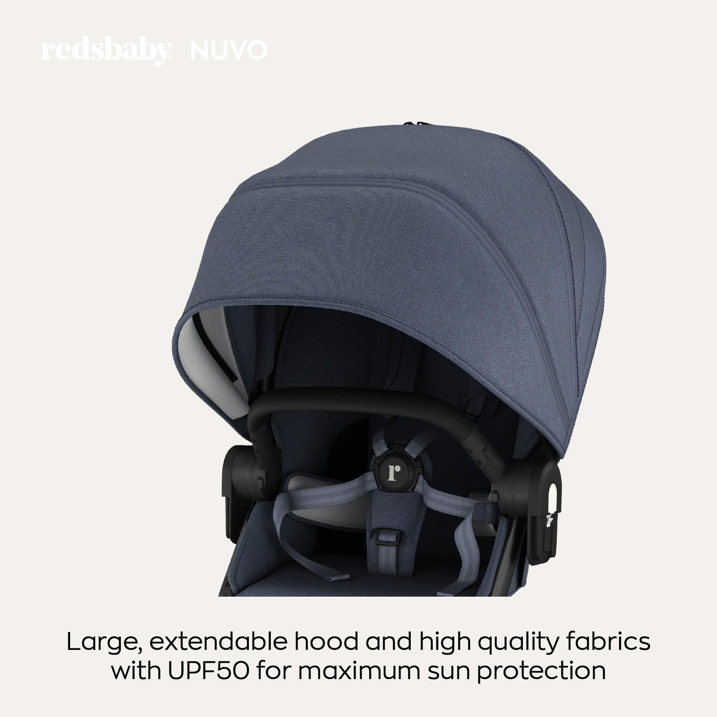 Close-up image focusing on the canopy of a navy blue stroller with the text "reds baby NUVO. Large, extendable hood and high quality fabrics with UPF50 for maximum sun protection." The hood is extended to show its size and texture.